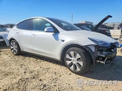 Czwarte zdjęcie samochodu z boku: 2021 TESLA MODEL Y VIN:5YJYGDEE8MF232010 - miniatura