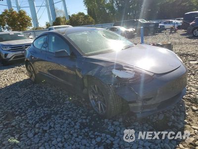 Czwarte zdjęcie samochodu z boku: 2022 TESLA MODEL 3 VIN:5YJ3E1EA7NF329051 - miniatura