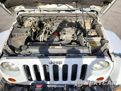 Zdjęcie 12 z 13 samochodu: 2012 JEEP WRANGLER UNLIMITED SAHARA VIN:1C4BJWEG6CL205341 - miniatura