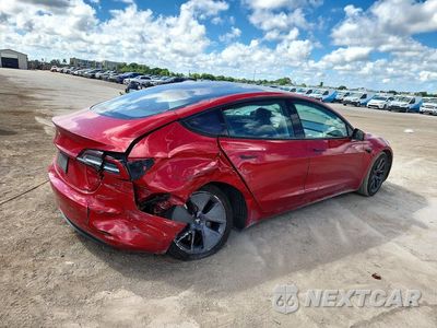 Trzecie zdjęcie samochodu z tyłu: 2023 TESLA MODEL 3 VIN:5YJ3E1EA2PF447866 - miniatura