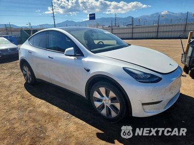 Czwarte zdjęcie samochodu z boku: 2023 TESLA MODEL Y VIN:7SAYGDEE1PA082990 - miniatura