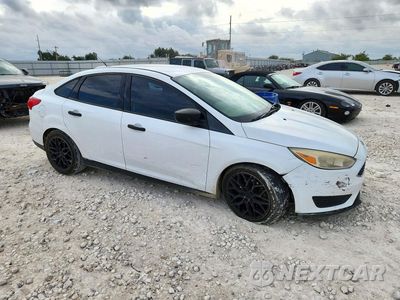 Czwarte zdjęcie samochodu z boku: 2018 FORD FOCUS S VIN:1FADP3E24JL277426 - miniatura