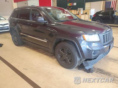 Czwarte zdjęcie samochodu z boku: 2013 JEEP GRAND CHEROKEE LAREDO VIN:1C4RJFAG9DC503193 - miniatura