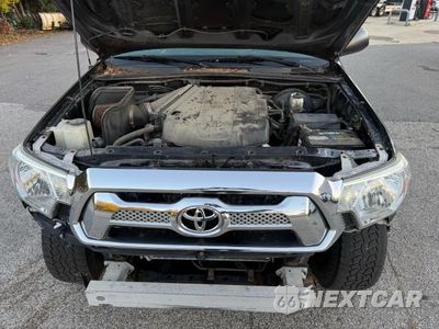 Zdjęcie 7 z 14 samochodu: 2015 TOYOTA TACOMA V6 VIN:3TMLU4EN3FM199466 - miniatura