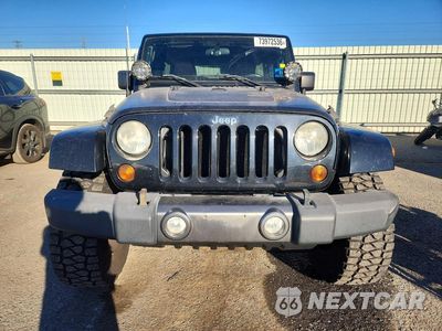 Piąte zdjęcie samochodu w środku: 2011 JEEP WRANGLER UNLIMITED SPORT VIN:1J4HA3H1XBL615388 - miniatura
