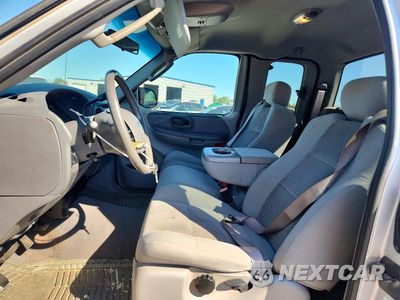 Zdjęcie 7 z 12 samochodu: 2003 FORD F150 VIN:1FTRX17263NA77270 - miniatura