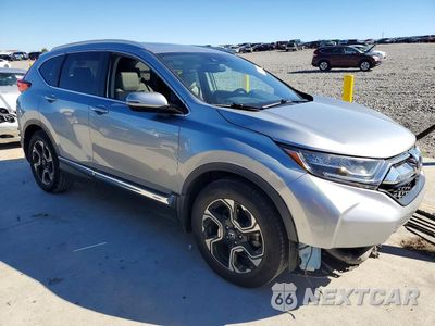 Czwarte zdjęcie samochodu z boku: 2019 HONDA CR-V TOURING VIN:7FARW1H95KE010840 - miniatura