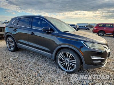 Czwarte zdjęcie samochodu z boku: 2015 LINCOLN MKC VIN:5LMTJ2AH4FUJ09307 - miniatura