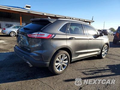 Trzecie zdjęcie samochodu z tyłu: 2019 FORD EDGE TITANIUM VIN:2FMPK4K95KBC23417 - miniatura