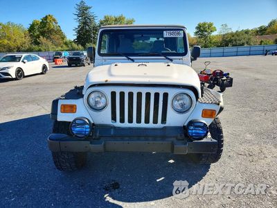 Piąte zdjęcie samochodu w środku: 2004 JEEP WRANGLER / TJ SE VIN:1J4FA29114P722583 - miniatura