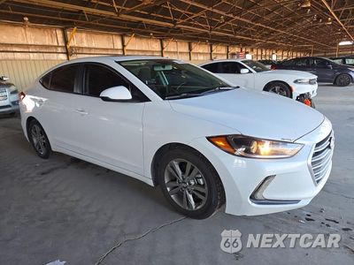 Czwarte zdjęcie samochodu z boku: 2018 HYUNDAI ELANTRA VALUE EDITION VIN:5NPD84LF5JH316354 - miniatura