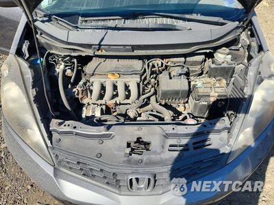 Zdjęcie 11 z 12 samochodu: 2013 HONDA FIT SPORT VIN:JHMGE8H57DC030307 - miniatura