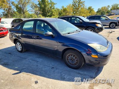 Czwarte zdjęcie samochodu z boku: 2004 FORD FOCUS LX VIN:1FAFP33P44W201800 - miniatura