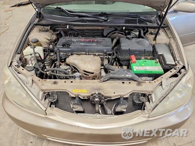 Zdjęcie 11 z 12 samochodu: 2003 TOYOTA CAMRY LE VIN:4T1BE32K53U133260 - miniatura