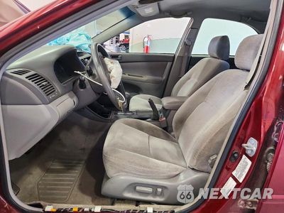 Zdjęcie 7 z 13 samochodu: 2003 TOYOTA CAMRY LE VIN:4T1BE32K43U234855 - miniatura