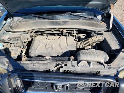 Zdjęcie 11 z 12 samochodu: 2008 HONDA RIDGELINE RTX VIN:2HJYK16358H539852 - miniatura