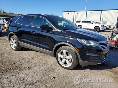 Czwarte zdjęcie samochodu z boku: 2017 LINCOLN MKC PREMIERE VIN:5LMCJ1C98HUL03986 - miniatura