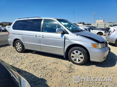 Czwarte zdjęcie samochodu z boku: 2003 HONDA ODYSSEY EXL VIN:5FNRL18943B060019 - miniatura
