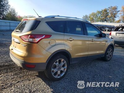 Trzecie zdjęcie samochodu z tyłu: 2014 FORD ESCAPE TITANIUM VIN:1FMCU9J9XEUE41732 - miniatura
