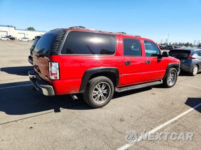 Trzecie zdjęcie samochodu z tyłu: 2000 CHEVROLET SUBURBAN C1500 VIN:3GNEC16T3YG164314 - miniatura
