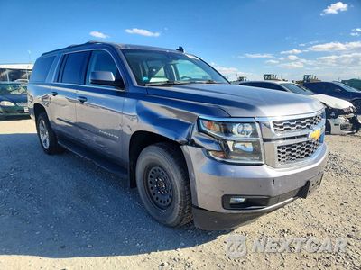Czwarte zdjęcie samochodu z boku: 2018 CHEVROLET SUBURBAN K1500 LT VIN:1GNSKHKC1JR182191 - miniatura