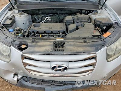 Zdjęcie 12 z 13 samochodu: 2012 HYUNDAI SANTA FE GLS VIN:5XYZGDAB8CG130360 - miniatura