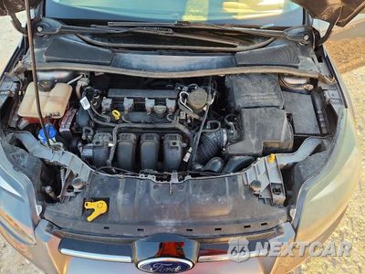 Zdjęcie 11 z 12 samochodu: 2014 FORD FOCUS TITANIUM VIN:1FADP3N22EL381001 - miniatura