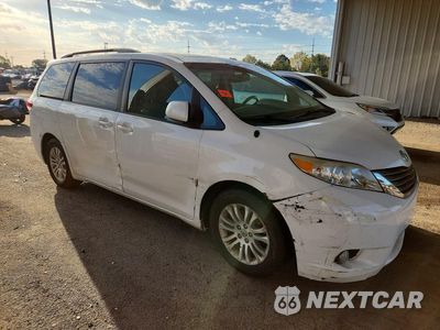 Czwarte zdjęcie samochodu z boku: 2014 TOYOTA SIENNA XLE 8-PASSENGER VIN:5TDYK3DC0ES454627 - miniatura