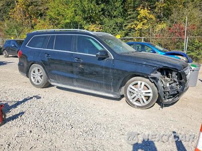 Czwarte zdjęcie samochodu z boku: 2014 MERCEDES-BENZ GL 450 4MATIC VIN:4JGDF7CE1EA433727 - miniatura