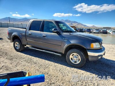 Czwarte zdjęcie samochodu z boku: 2003 FORD F150 SUPERCREW VIN:1FTRW08L03KA14042 - miniatura