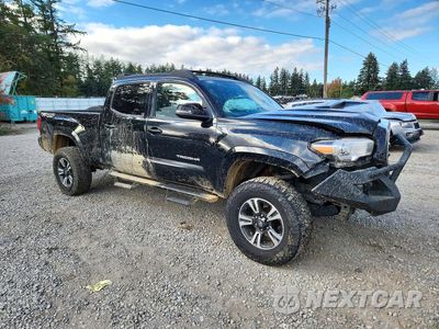 Czwarte zdjęcie samochodu z boku: 2016 TOYOTA TACOMA TRD SPORT VIN:3TMDZ5BN5GM002234 - miniatura