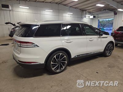 Trzecie zdjęcie samochodu z tyłu: 2020 LINCOLN AVIATOR RESERVE VIN:5LM5J7XC5LGL04442 - miniatura