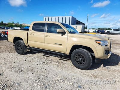 Czwarte zdjęcie samochodu z boku: 2020 TOYOTA TACOMA SR5 V6 VIN:3TMAZ5CNXLM117746 - miniatura