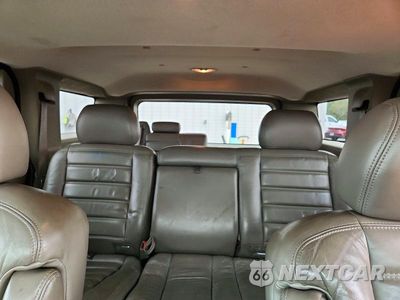 Zdjęcie 10 z 13 samochodu: 2003 HUMMER H2 VIN:5GRGN23U63H137636 - miniatura