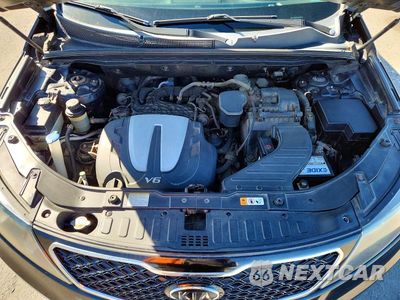 Zdjęcie 12 z 13 samochodu: 2013 KIA SORENTO SX VIN:5XYKW4A25DG419766 - miniatura