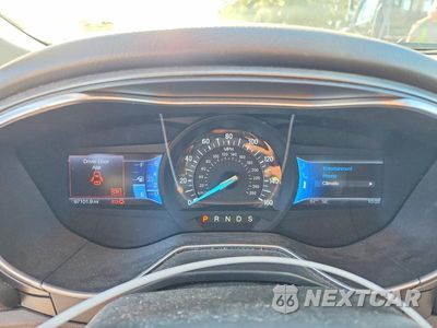 Zdjęcie 9 z 12 samochodu: 2013 FORD FUSION TITANIUM VIN:3FA6P0D97DR160709 - miniatura