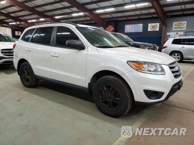 Czwarte zdjęcie samochodu z boku: 2012 HYUNDAI SANTA FE GLS VIN:5XYZGDAB9CG116175 - miniatura