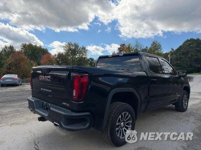 Czwarte zdjęcie samochodu z boku: 2021 GMC SIERRA K1500 AT4 VIN:3GTU9EET5MG378940 - miniatura
