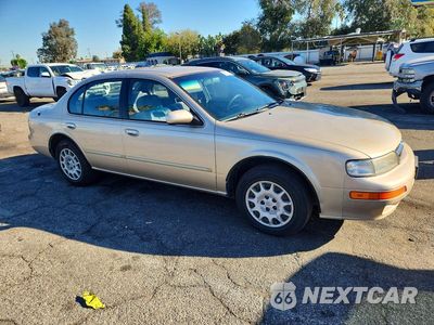 Czwarte zdjęcie samochodu z boku: 1998 NISSAN MAXIMA GXE VIN:JN1CA21D4WT530716 - miniatura