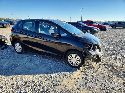 Czwarte zdjęcie samochodu z boku: 2016 HONDA FIT LX VIN:JHMGK5H57GX026603 - miniatura