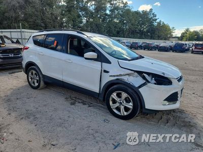 Czwarte zdjęcie samochodu z boku: 2016 FORD ESCAPE SE VIN:1FMCU0GX7GUC62200 - miniatura