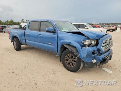 Czwarte zdjęcie samochodu z boku: 2019 TOYOTA TACOMA SR5 V6 VIN:3TMBZ5DN5KM021413 - miniatura