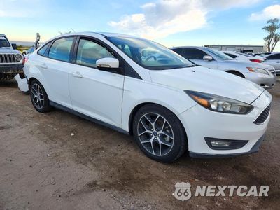 Czwarte zdjęcie samochodu z boku: 2017 FORD FOCUS SEL VIN:1FADP3H25HL344105 - miniatura