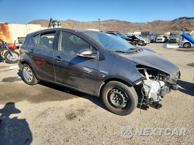 Czwarte zdjęcie samochodu z boku: 2015 TOYOTA PRIUS C TWO VIN:JTDKDTB32F1100335 - miniatura