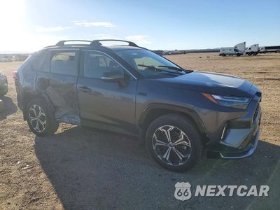 Czwarte zdjęcie samochodu z boku: 2023 TOYOTA RAV4 PRIME XSE VIN:JTMEB3FV6PD125169 - miniatura