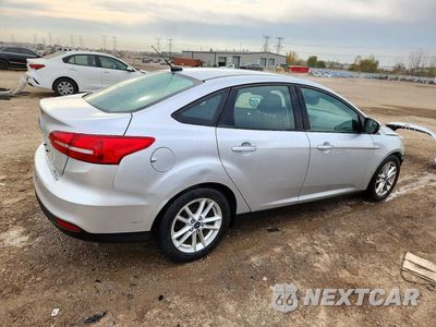 Trzecie zdjęcie samochodu z tyłu: 2016 FORD FOCUS SE VIN:1FADP3F26GL290590 - miniatura