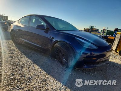 Czwarte zdjęcie samochodu z boku: 2023 TESLA MODEL 3 VIN:5YJ3E1EC5PF711325 - miniatura