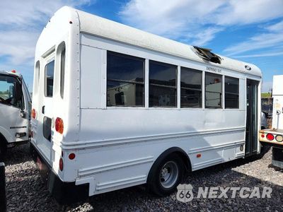 Czwarte zdjęcie samochodu z boku: 2018 CHEVROLET EXPRESS SCHOOL BUS VIN:1GB3GSBG0H1345215 - miniatura