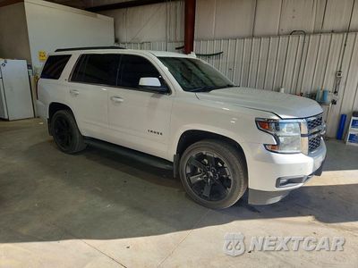 Czwarte zdjęcie samochodu z boku: 2019 CHEVROLET TAHOE K1500 LT VIN:1GNSKBKC0KR300102 - miniatura