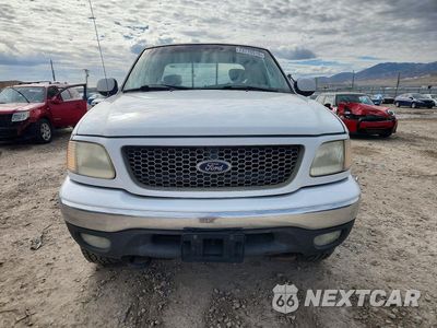 Piąte zdjęcie samochodu w środku: 2001 FORD F150 VIN:1FTRX18W31NA50445 - miniatura